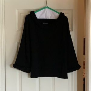 Knit shirt with fun neck and cuffs on sleeves.